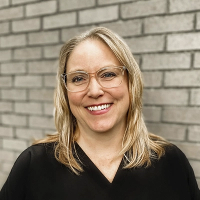 A headshot of Christine Dacus, a Licensed Massage Therapist at Premier Family Chiropractic.