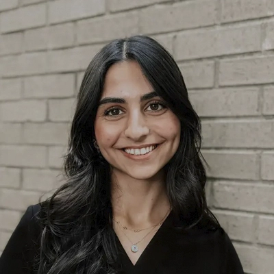 A headshot of Delaveen Oray, a Chiropractic Therapy Assistant at Premier Family Chiropractic.